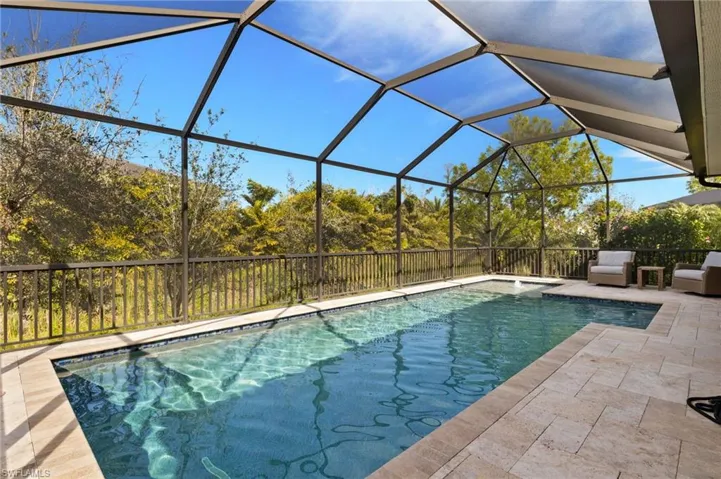 View of pool featuring a lanai and a patio