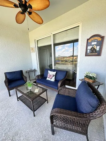 View of patio / terrace featuring an outdoor hangout area and ceiling fan