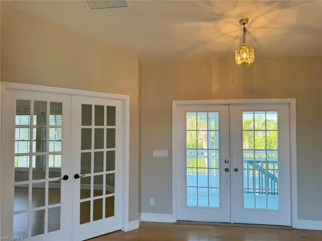 French Door Front Entry. Bedroom to the Left.