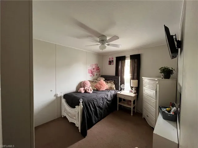 #2Bedroom with carpet flooring and ceiling fan