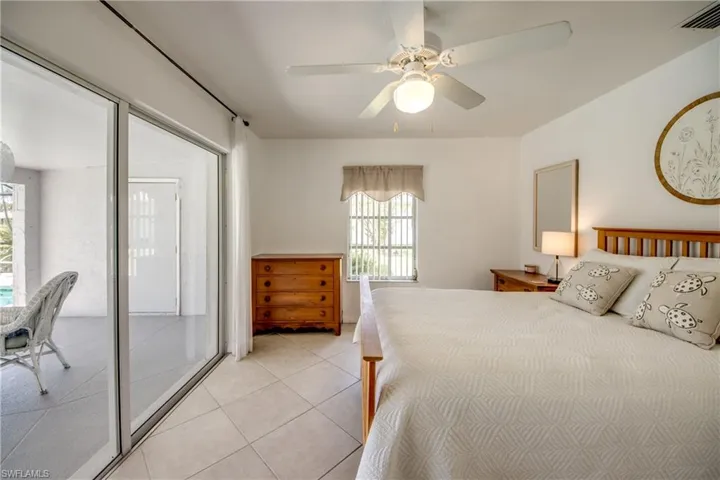 guest bedroom # 2 with sliders to the lanai