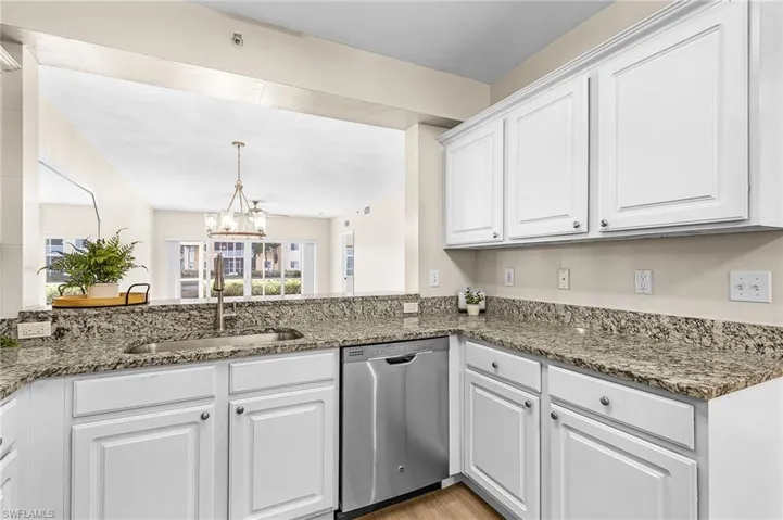 Granite counters, open to family room