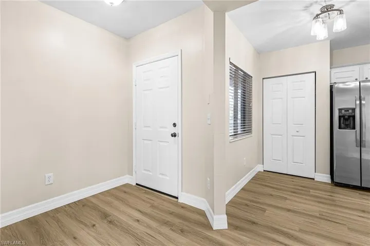Foyer entrance featuring LVT  floors