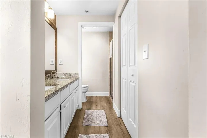 Primary walk in closet, shower, LVT, double sn=ink