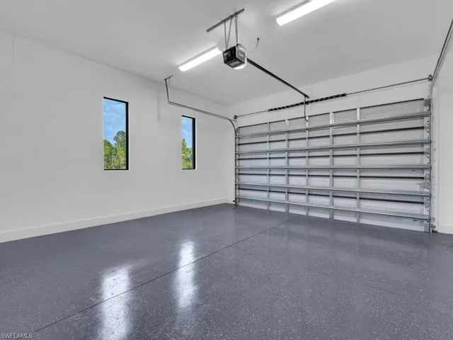 Garage with a garage door opener.