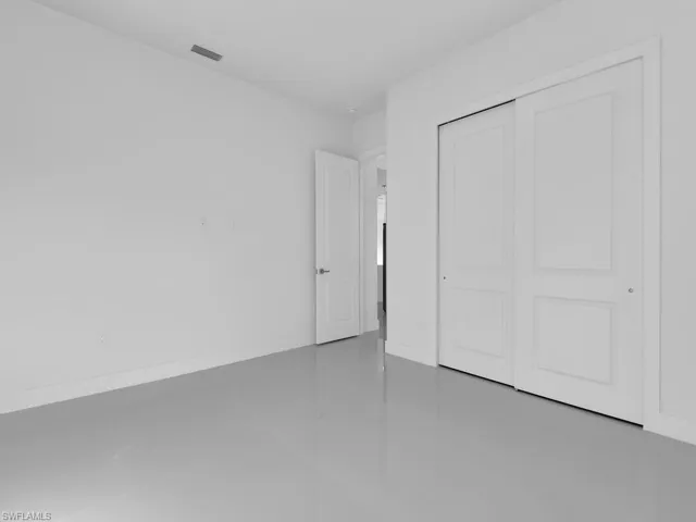 Bedroom # 3 featuring a closet