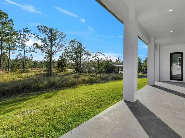 View of yard featuring a patio.