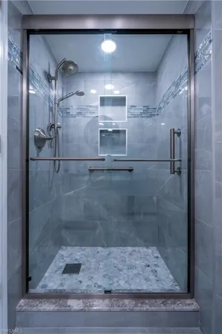 Bathroom featuring walk in shower