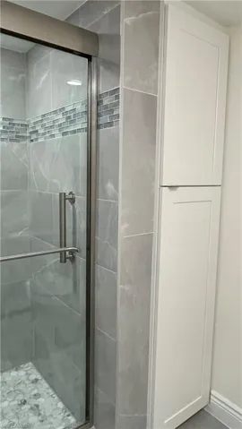 Bathroom featuring an enclosed shower