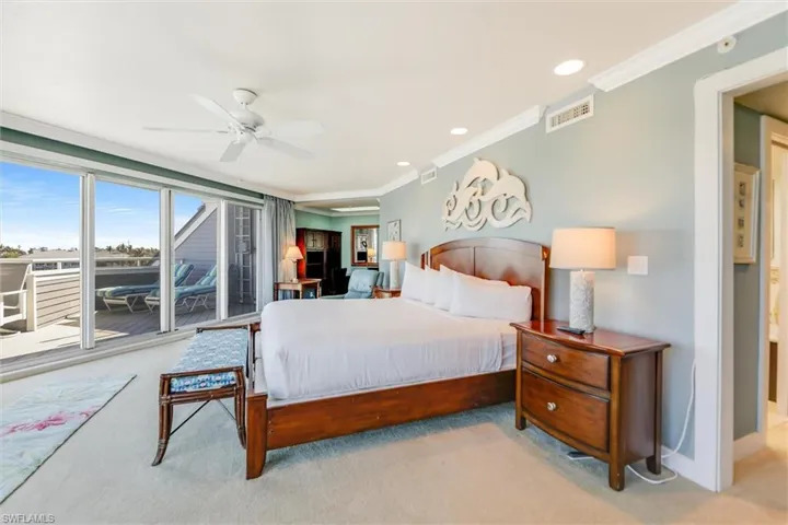 Bedroom featuring carpet, recessed lighting, ornamental molding, and ceiling fan