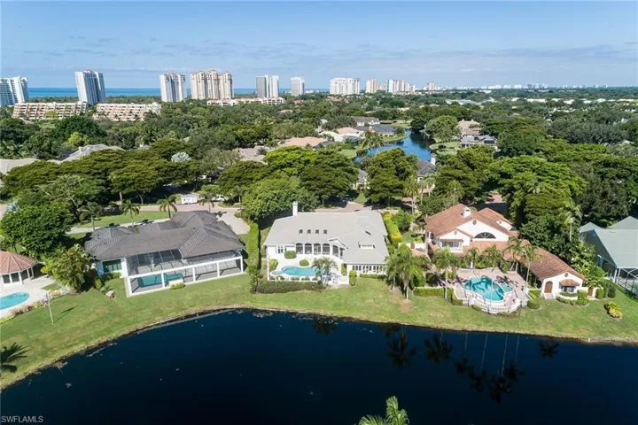 View of urban area featuring a large body of water and nearby suburban area