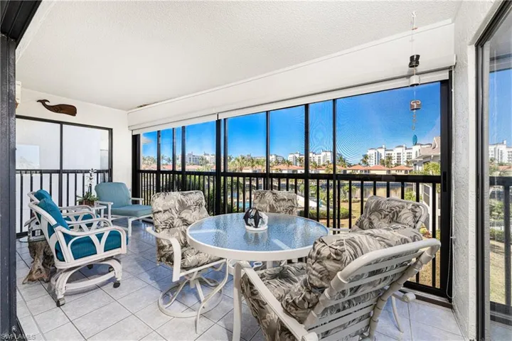 Lanai serves as a Florida Room and is screened as well as has sliders
