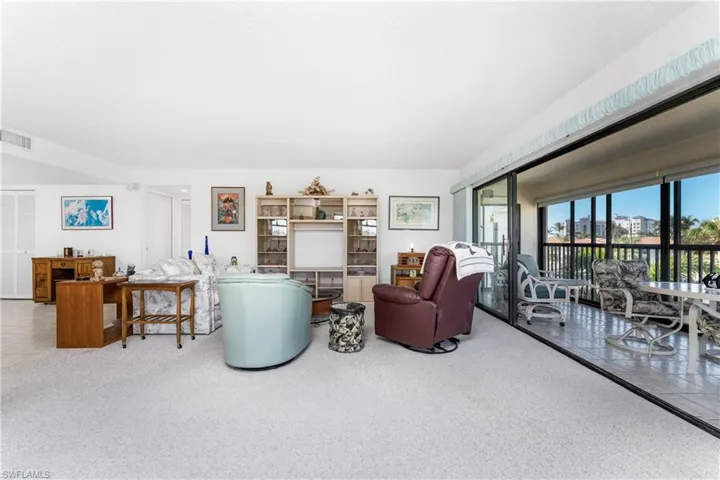 Living room with carpet floors