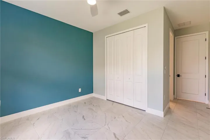 Guest suite with private full bath. Left off entryway.