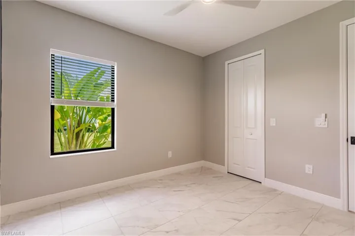 Bedroom 2 with walk-in closet.