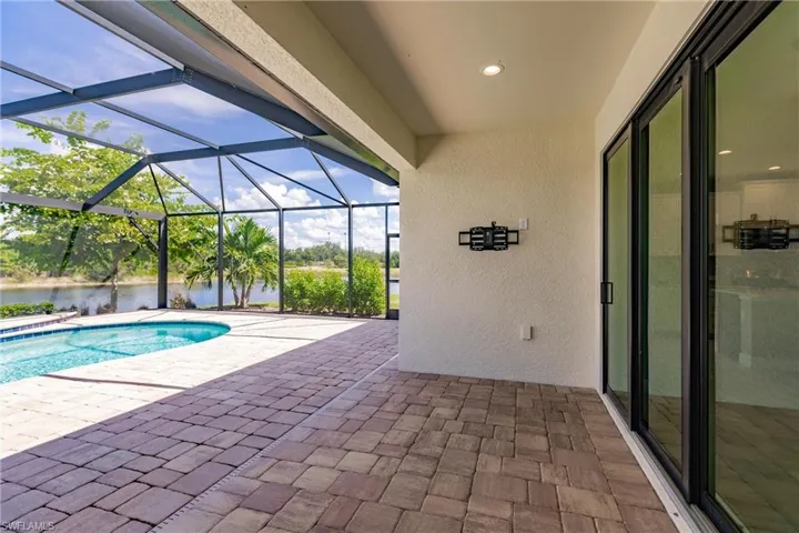 Relaxing lanai and deck with private lake views all around.