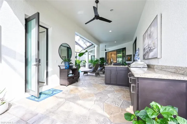 Built-in kitchen views toward guest suite cabana off of the courtyard