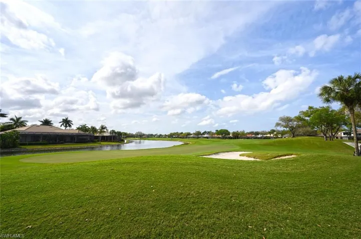 Fabulous panoramic lake and 9th green golf course views