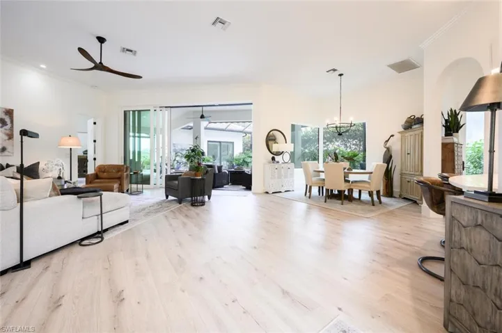 Open floor plan with abundant natural light  and luxury vinyl floors throughout