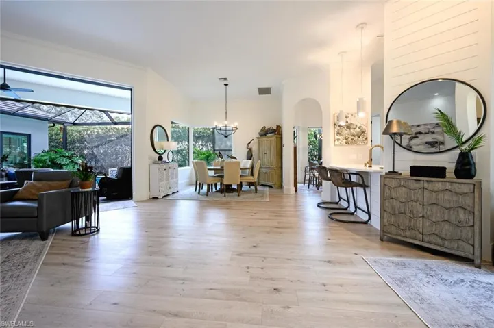 Panning right toward the dining area, breakfast room and open concept kitchen