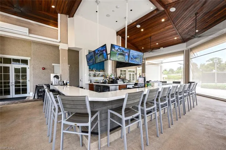 View of patio / terrace featuring french doors and a wall mounted air conditioner