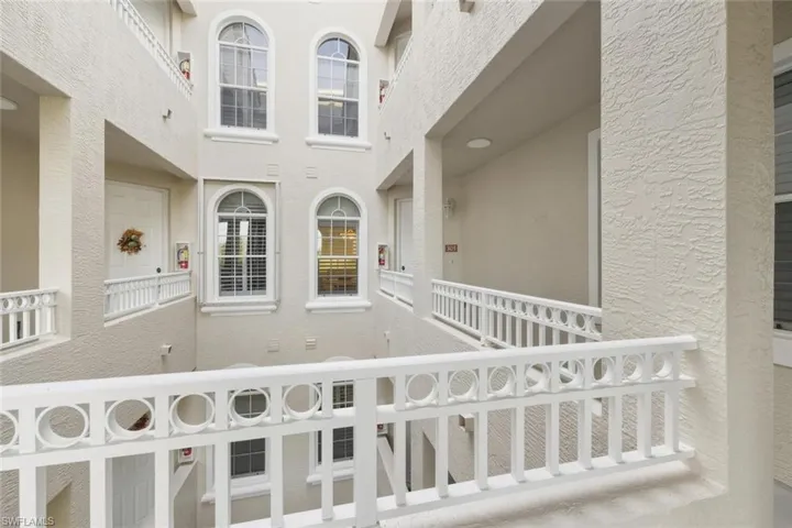 View of exterior entry with stucco siding