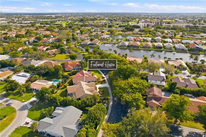 Aerial view of home and neighborhood