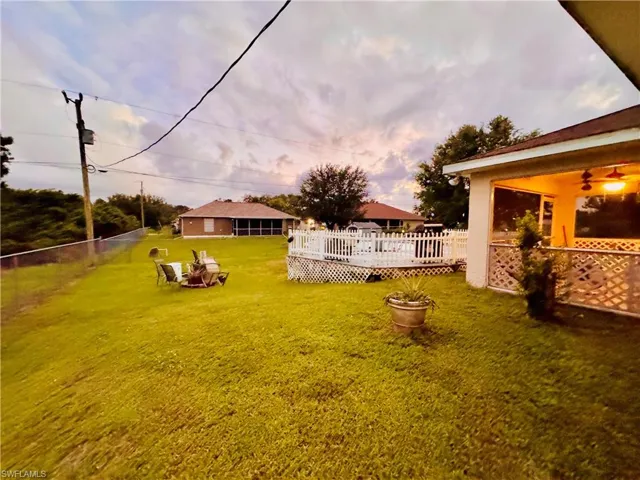 View of yard with a deck