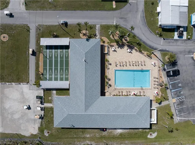 Aerial overview of property's location with a pool