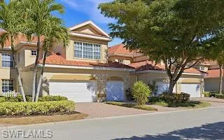 Mediterranean / spanish-style home featuring stucco siding, driveway, and an attached garage