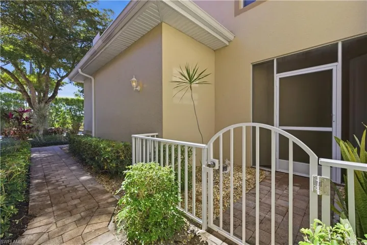 View of side of property featuring stucco siding