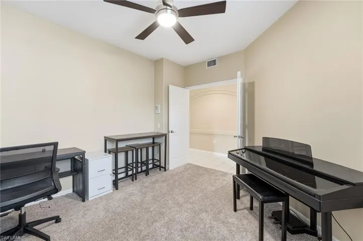 The den/office offers versatile space that can easily be configured as a third bedroom.