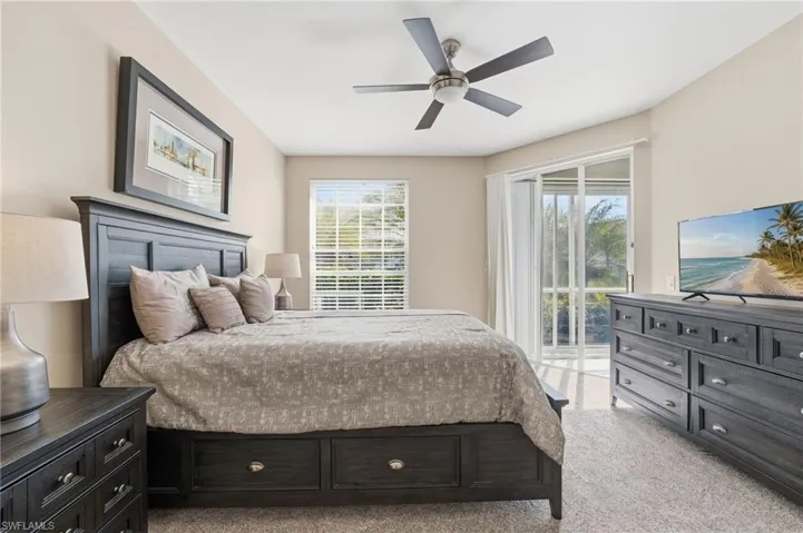 The primary bedroom offers private access to the lanai—perfect for enjoying your morning coffee while watching the surrounding wildlife.