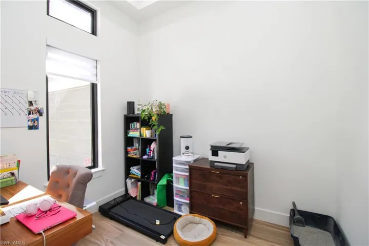Office space featuring light hardwood / wood-style floors