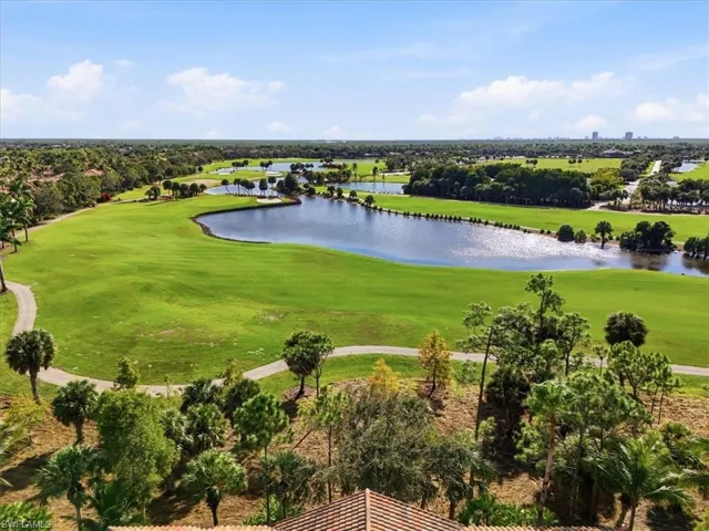 Aerial view of a nearby body of water and a golf course