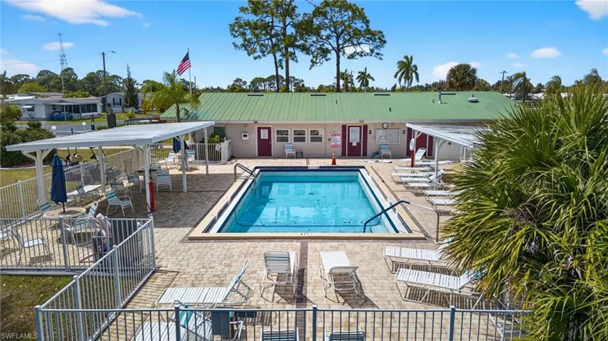 Community pool with a patio area