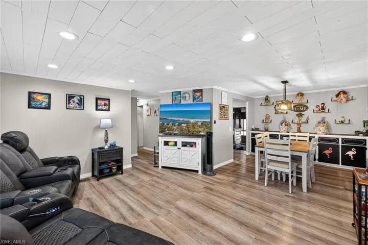 Living room featuring luxury vinyl wood plank flooring