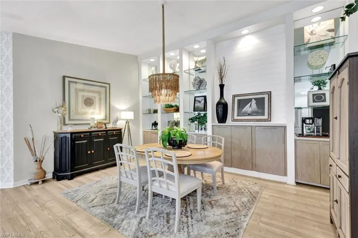 Light wood-finish flooring with recessed lighting