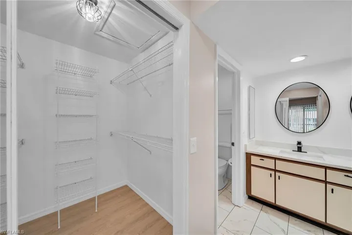 Master Bathroom with Walk in closet, Double Mirrors, Granite Counters, New Faucet and Lighting