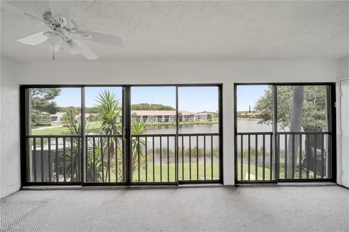 Glass Enclosed Sunroom with a Big Lake view and extra air conditioned Living space