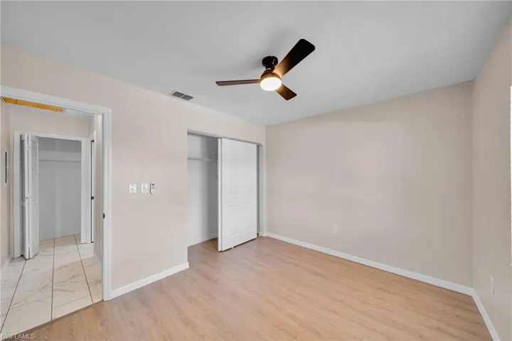 Guest bedroom off hall to guest bathroom