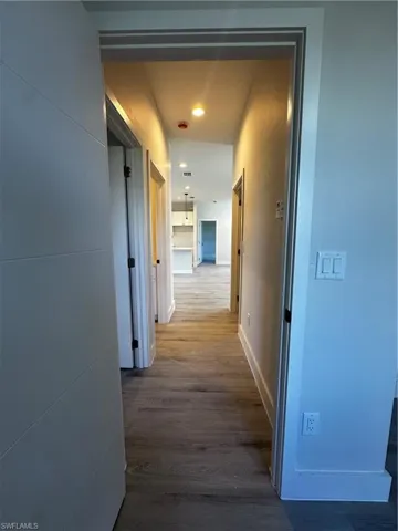 Hall featuring hardwood / wood-style floors