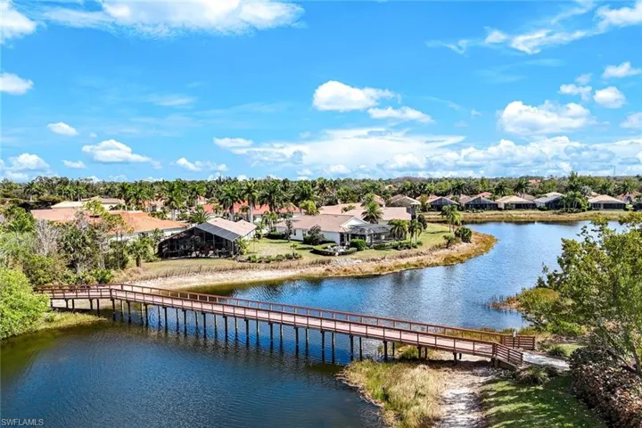 A charming bridge built over the water - fish, stroll, take in the beauty of the community.