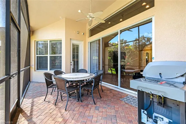 The spacious lanai offers plenty of room for dining and entertaining.
