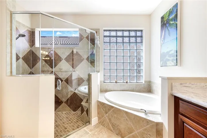Enjoy the convenience of both a large walk-in shower and a soaking tub.