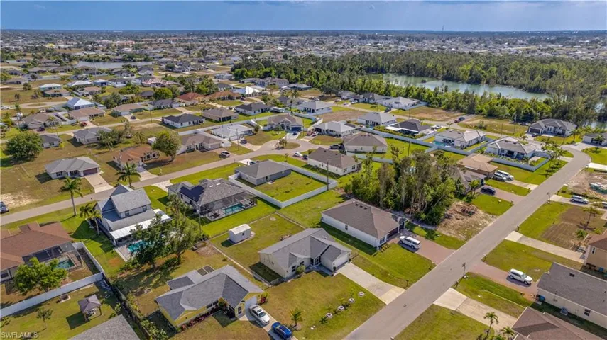 Ariel view of the front of the home and the area.