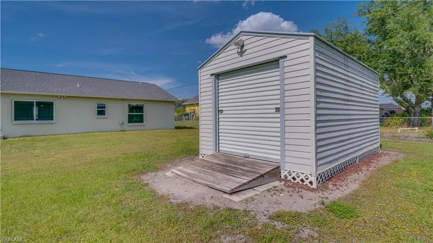 Large 10 X 16 permitted storage shed with electric.