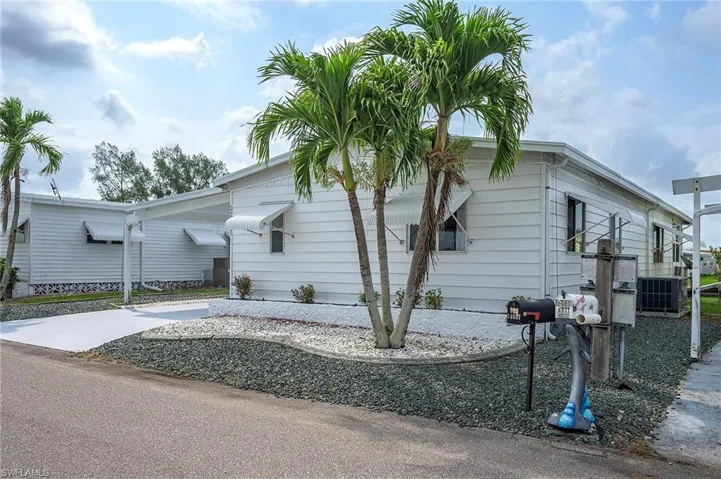 View of home's exterior featuring central AC