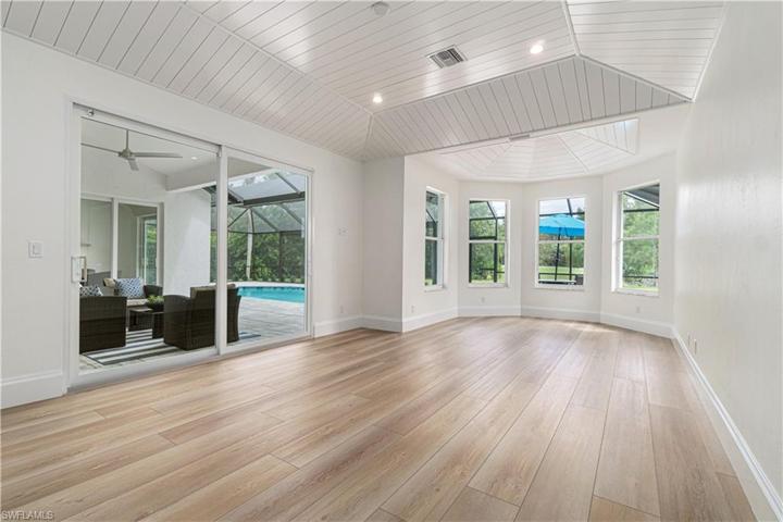 Beautifully done Master Bedroom with Shiplap detailing on the ceiling for a fabulous look.