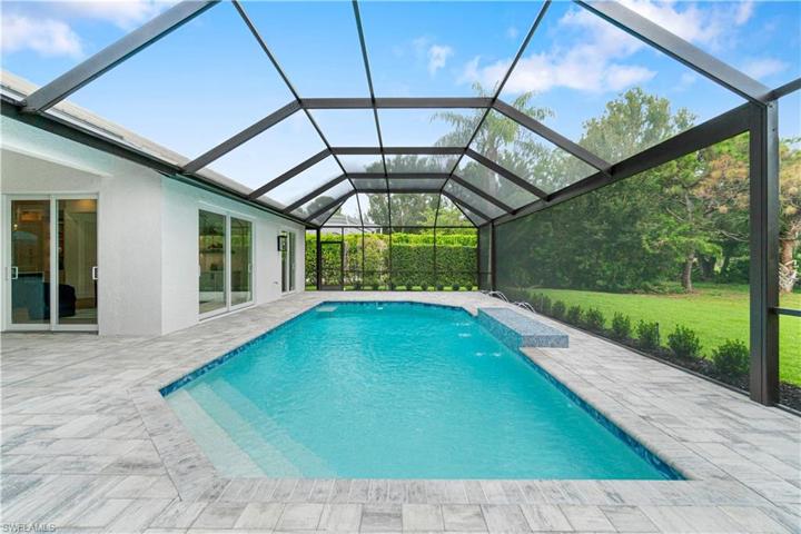 New pavers,  New Cage with Super Screens, New water feature in pool.
